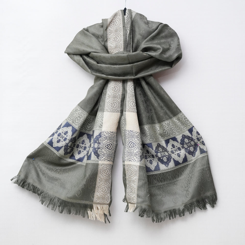 Green scarf with blue and white pattern on a white DUPPATTY WALAY